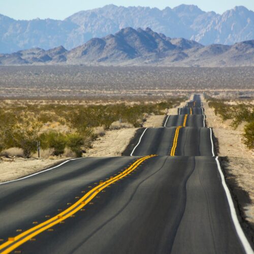 bumpy road in middle of the desert