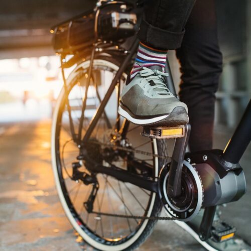 person pedaling a bike