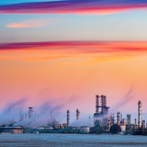 refinery at sunset
