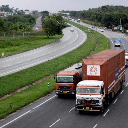 trucks on the highway in India
